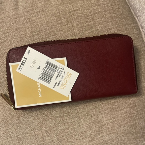 Michael Kors Wallet Merlot color, bought from Michael Kors. - Picture 2 of 6